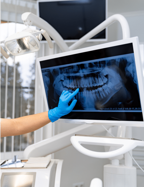 Dentist reviewing x-rays