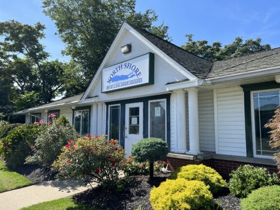 Outside view of the front door of the North Shore Implant and Oral Surgery office.